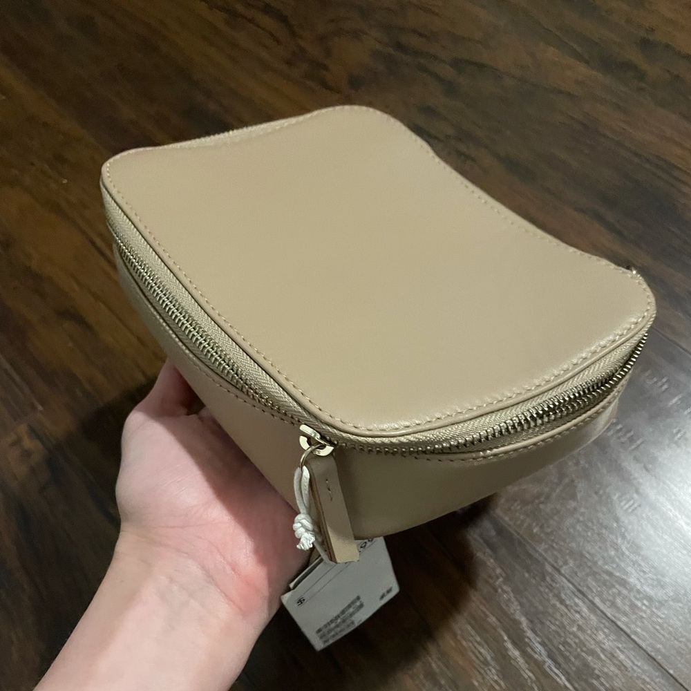 Leather makeup pouch with tags
